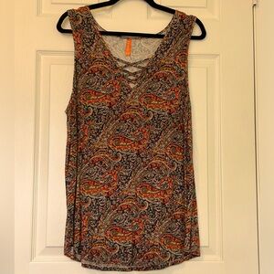 Cute knit sleeveless top with cage at the neckline